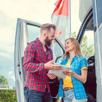 couple learning how to buy a used RV from a private party
