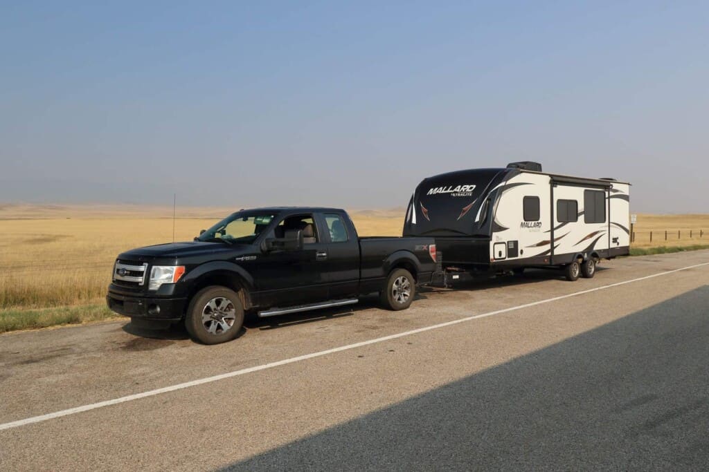 truck towing one of the best travel trailer brands of 2022