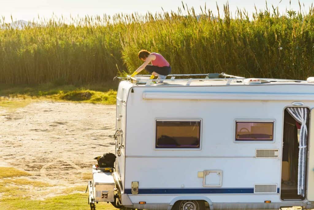 Inspect your RV roof during a campsite breakdown.