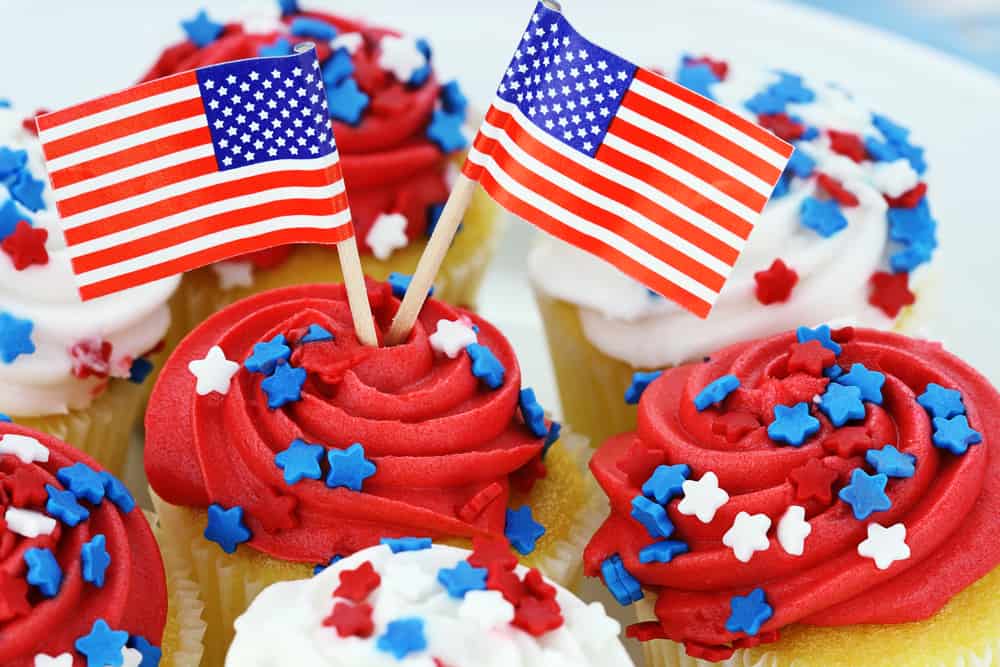 red white blue July 4th bbq cupcakes with american flag decorations