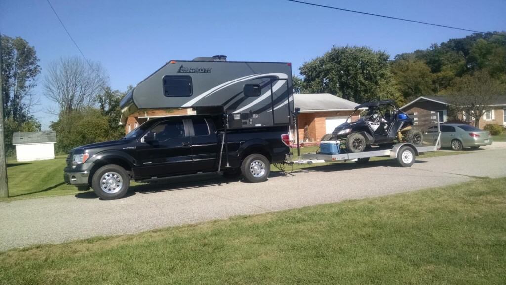F150 truck towing camper and utility trailer with OHV
