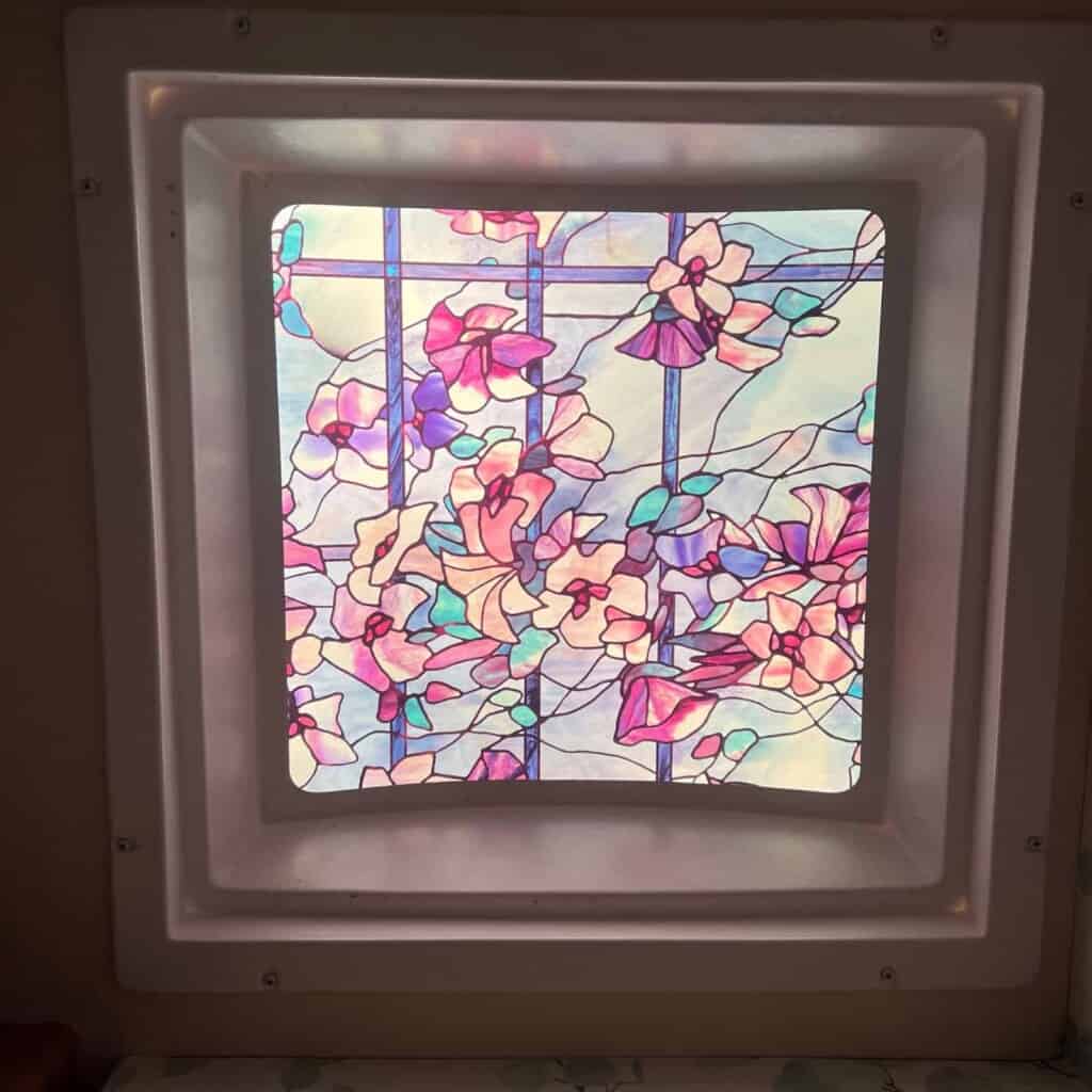 Artscape RV shower upgrade window cling decal (Image; Erik Anderson)