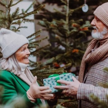 senior couple exchanging gifts (Image: Shutterstock)