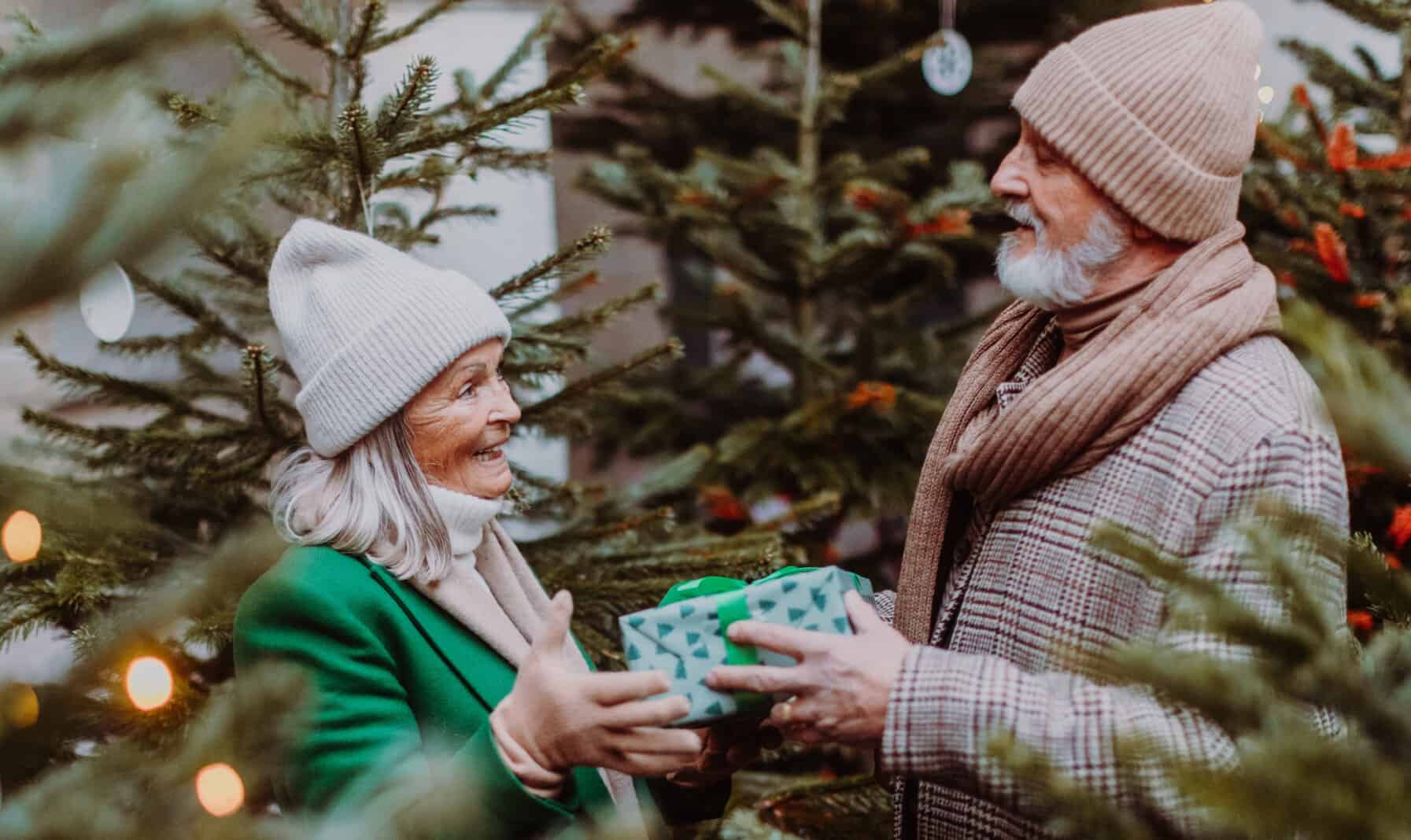 senior couple exchanging gifts (Image: Shutterstock)
