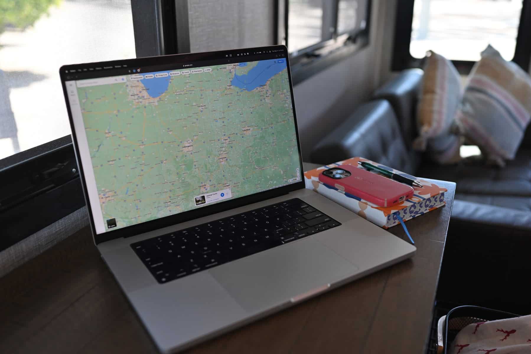 Laptop with map showing apps for RVers (Image: RV LIFE)